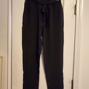 Never worn. Black paperbag pants.